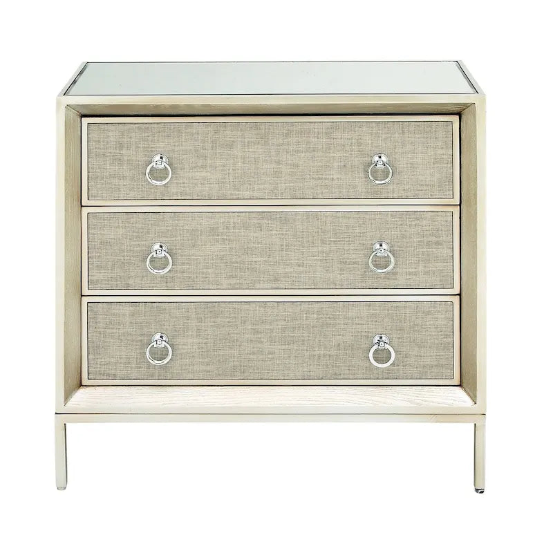Comodino Comò con Pannello Anteriore Tappezzato in Legno, 3 Cassetti, Top a Specchio e Maniglie ad Anello - Beige - Roche River Decor