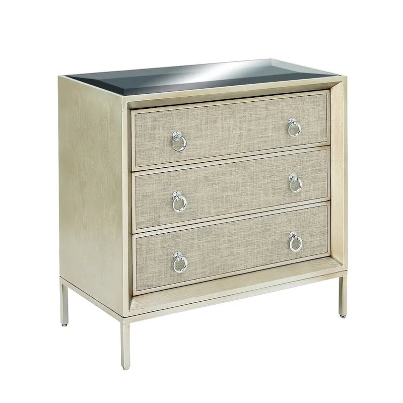 Comodino Comò con Pannello Anteriore Tappezzato in Legno, 3 Cassetti, Top a Specchio e Maniglie ad Anello - Beige - Roche River Decor